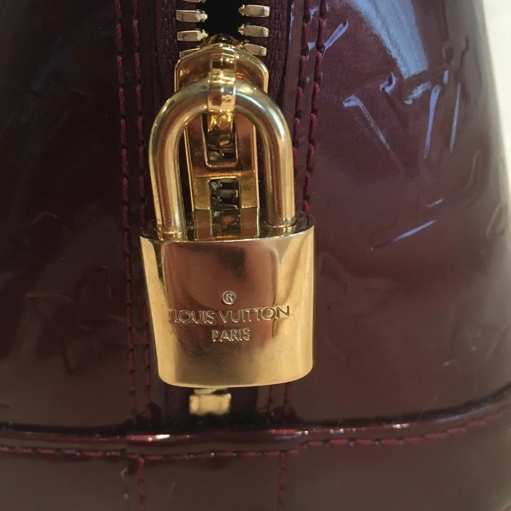 Louis Vuitton Alma pm rouge fauviste. Excellent